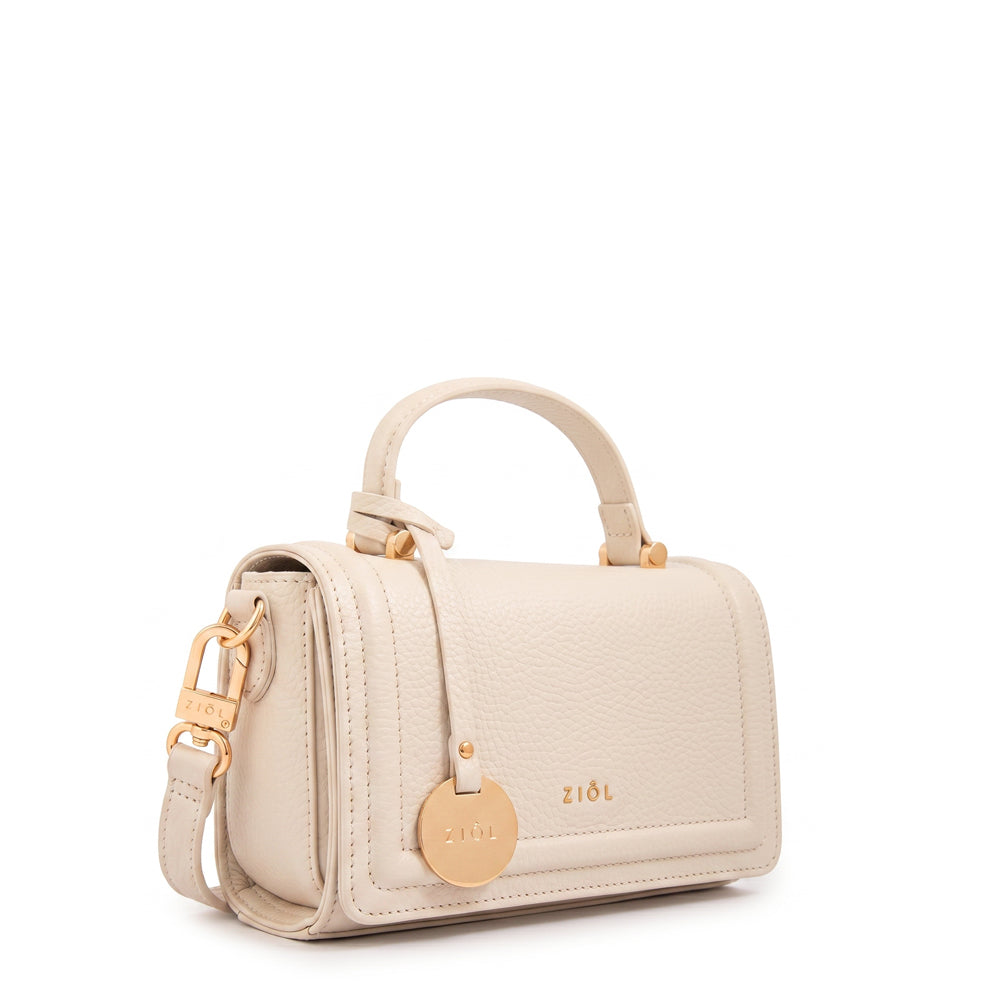 Cartera bandolera con tapa bruna blanco crudo